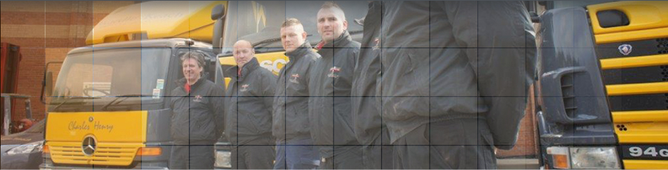 Removal Men standing ina line next to their company lorries
